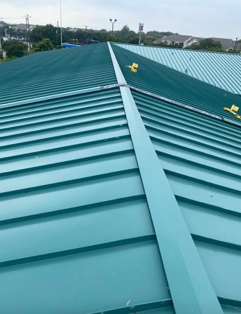 Green commercial metal roof ridge and valley for Metal Roof Repair in Aspen Hill