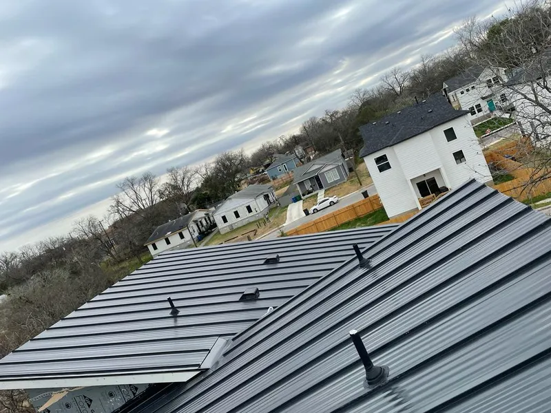 Standing seam metal roof panels with vents for Skylight Repair in Aspen Hill